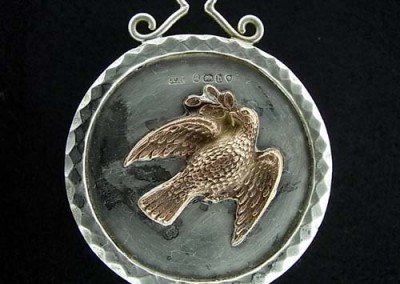 5   the electroformed bird is soldered onto pendant base